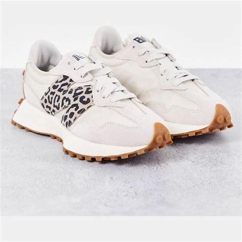 new balance 327 sneakers in off white with leopard print detail.